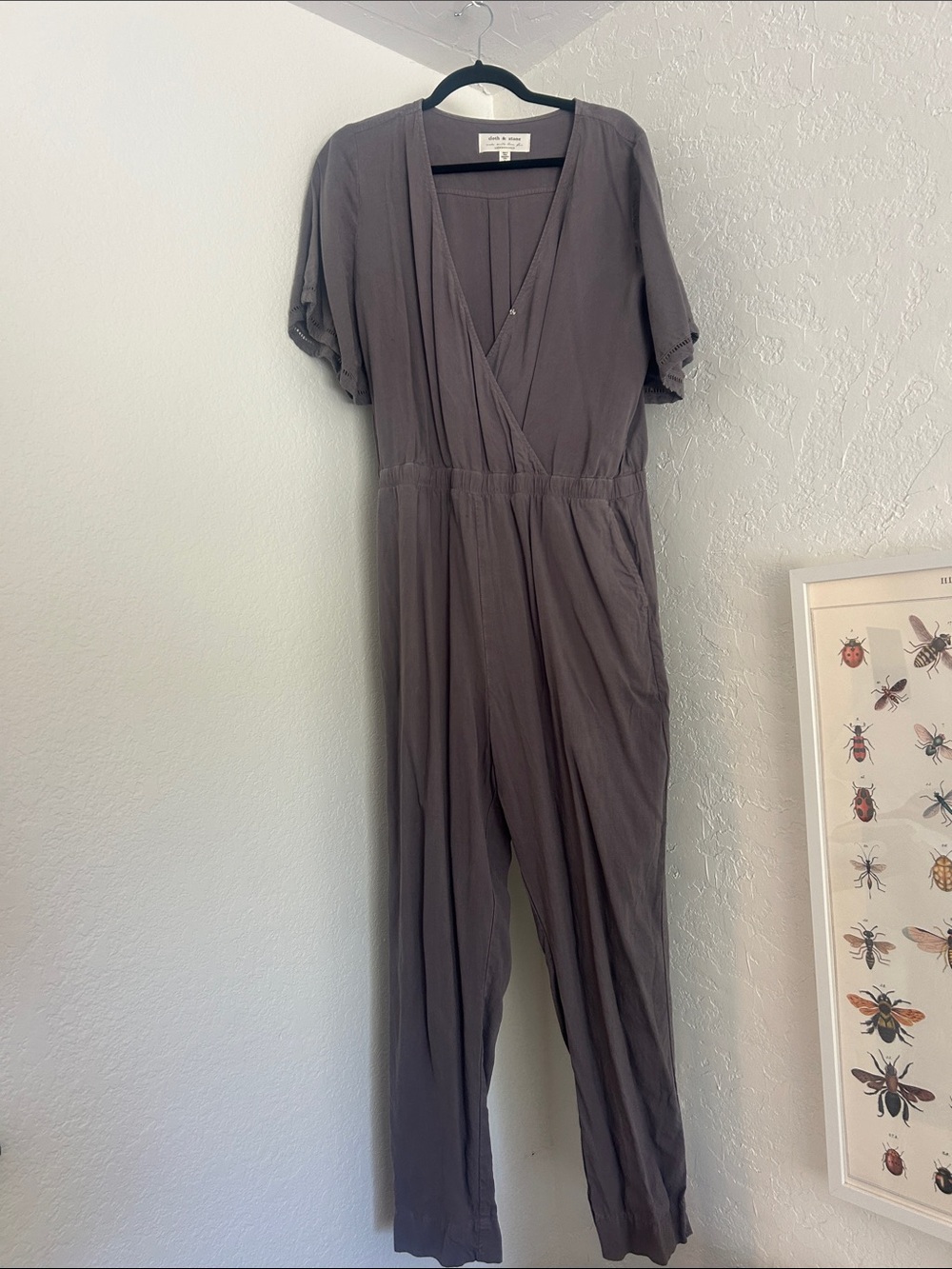 Anthropologie Gray Flutter Short-Sleeve Jumpsuit with defined waist.